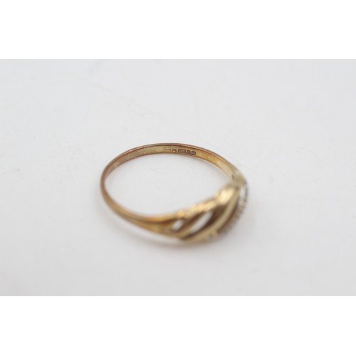 484 - 9ct gold diamond openwork ring (2g)