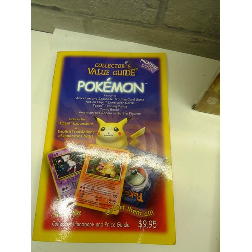 39 - POKEMON PIKACHU WORLD COLLECTION UN-OPENED POKEMON CARDS AND BOOKS