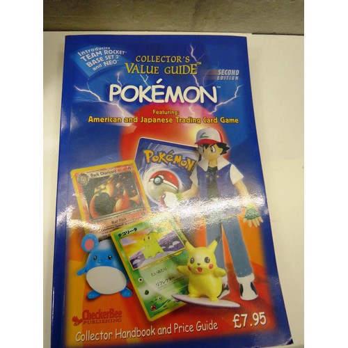 39 - POKEMON PIKACHU WORLD COLLECTION UN-OPENED POKEMON CARDS AND BOOKS