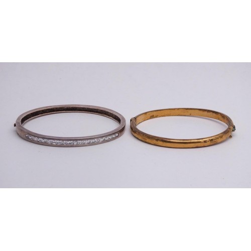 52 - 9ct GOLD METAL CORE BANGLE 6.8g AND SILVER BANGLE