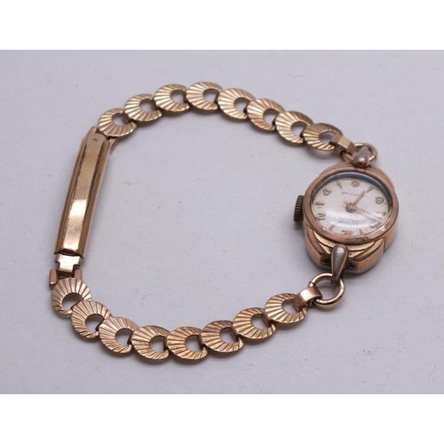 62 - LADIES LUSINA GENEVE WATCH WITH ROLLED GOLD WATCH WITH ROLLED GOLD BEZEL 17 JEWELS