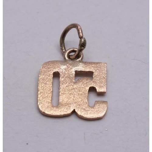 79 - 9ct GOLD 50 PENDANT/CHARM 1.5g