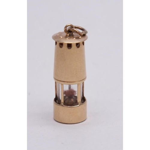 92 - 9ct GOLD MINERS LAMP 2.3g