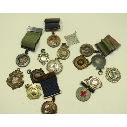 106 - COLLECTION OF VINTAGE FOBS AND MEDALS