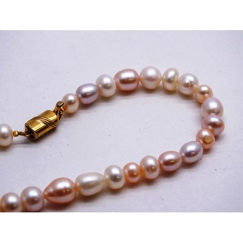 139 - ONE PEARL AND ONE GLASS NECKLACE WITH SILVER CLASPS