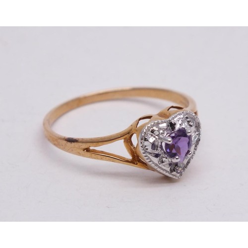 316 - 9CT GOLD HEART SHAPED RING PURPLE AND CLEAR STONES