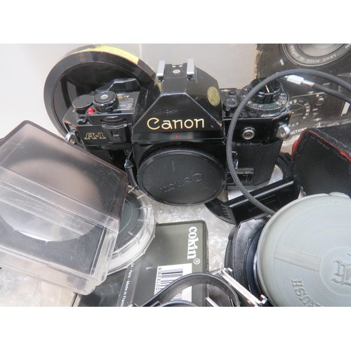 10 - CANON A1 CAMERA- SPARES/REPAIRS AND CAMERA ACCESSORIES