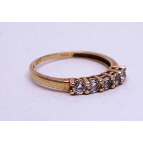 318 - 9CT GOLD RING WITH FIVE CZ STONES