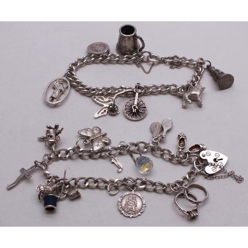 372 - 2 x SILVER CHARM BRACELETS - 56g