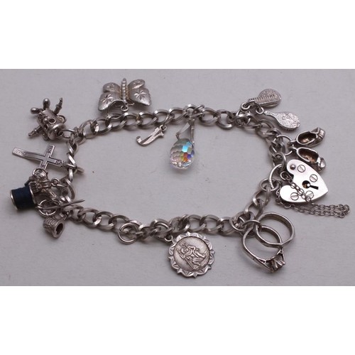 372 - 2 x SILVER CHARM BRACELETS - 56g