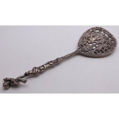 396 - WHITE METAL ORNATE SPOON