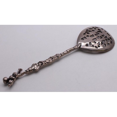 396 - WHITE METAL ORNATE SPOON