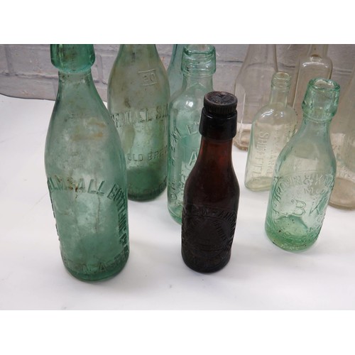 208 - 15 x OLD GLASS BOTTLES INCLUDES ADVERTISING - SAMUEL SMITHS ETC