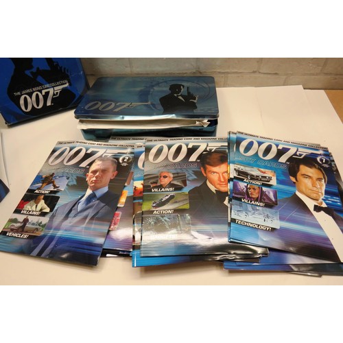 579 - QUANTITY OF JAMES BOND PUBLICATIONS AND TRADING CARDS