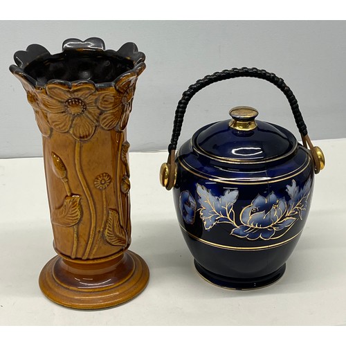 83 - VINTAGE TREACLE GLAZED VASE AND COBALT BLUE LIDDED JAR WITH WICKER HANDLE