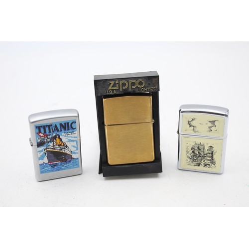 417 - 3 x Assorted ZIPPO Cigarette LIGHTERS Includes Vintage, Boxed, Brass, Titanic Etc