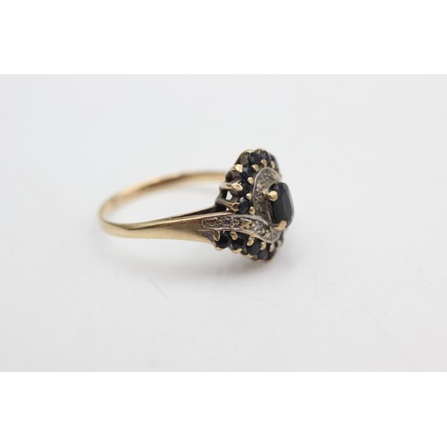 448 - 9ct gold diamond & sapphire dress ring (4g)Size-T