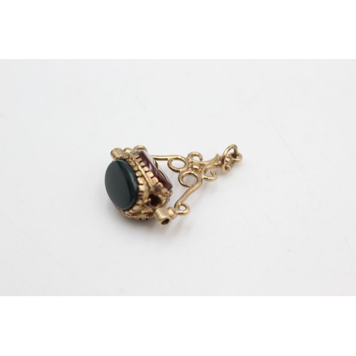 450 - 9ct gold bloodstone, carnelian & onyx spinner fob (3.4g)