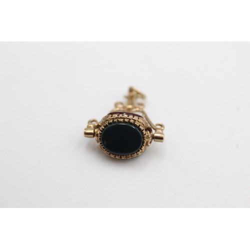 450 - 9ct gold bloodstone, carnelian & onyx spinner fob (3.4g)