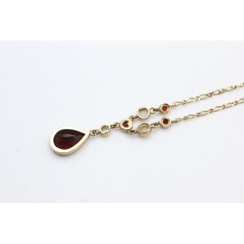 416 - 9ct gold garnet & seed pearl pendant on chain (2.9g)