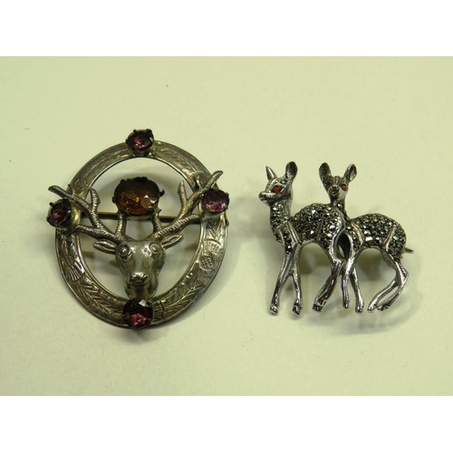 106 - SILVER SCOTTISH STAGS HEAD BROOCH AND SILVER MARCASITE DEERS BROOCH