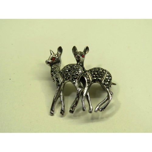106 - SILVER SCOTTISH STAGS HEAD BROOCH AND SILVER MARCASITE DEERS BROOCH