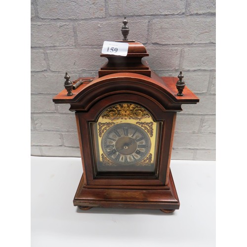 159 - ANTIQUE WOOD CASED MANTLE CLOCK WITH GOLD GILT CHERUB DETAIL, COMPLETE WITH KEY