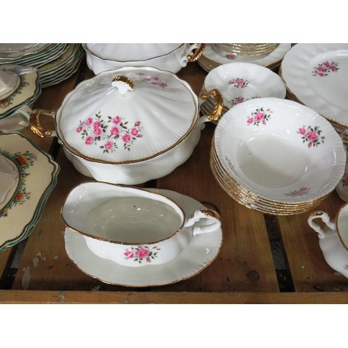 198 - FINE BONE CHINA DINNER SERVICE WITH ROSES PATTERN AND GILT