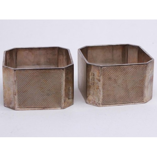 128 - BOXED PAIR OF STERLING SILVER NAPKIN RINGS WITH BIRMINGHAM HALLMARKS- 105G