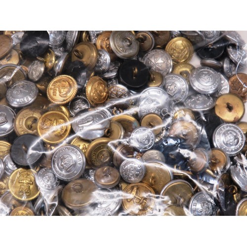 55 - APPROXIMATELY 2KG BAG OF UNIFORM BUTTONS- POLICE, FIRE, MILITARY AND COLLAR BADGES ETC