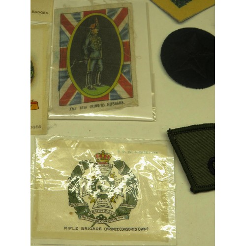 57 - BAG OF MILITARIA, BADGES, BUTTONS, CARDS ETC