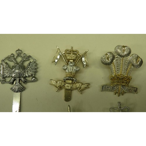 60 - TEN MILITARY CAP BADGES