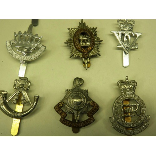 60 - TEN MILITARY CAP BADGES