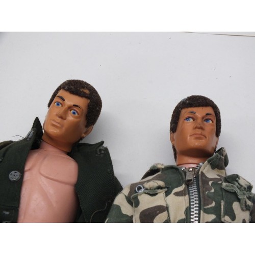 263 - TWO VINTAGE MOVING EYES FLOCK HAIR ACTION MEN