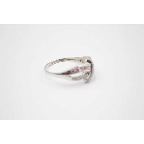 436 - 9ct white gold clear & pink gemstone fancy ring (2.3g)SIZE - U