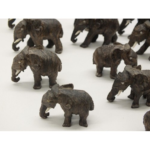 252 - 12 SMALL CARVED WOOD ELEPHANTS