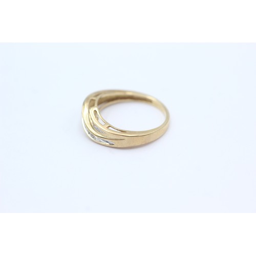 452 - 10ct Gold Diamond Channel Setting Stylised Dress Ring (2.6g)