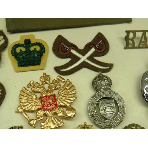 52 - BAG OF MILITARY AND OTHER BADGES