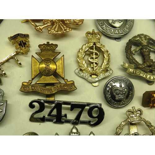52 - BAG OF MILITARY AND OTHER BADGES