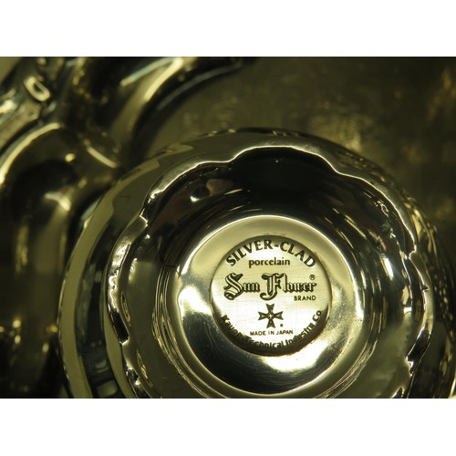 93 - SILVER CLAD PORCELAIN SUN FLOWER BRAND JAPANESE TEAPOT, SUGAR BOWL & MILK JUG WITH A SILVER PLATED S... 