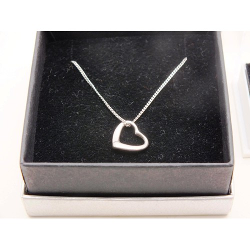 13 - 925 SILVER NECKLACE WITH HEART PENDANT AND SILVER HEART AND CZ RING