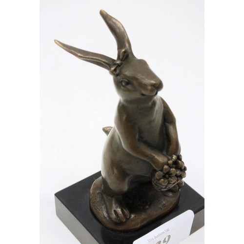 329 - BRONZE RABBIT HOLDING FLOWERS- SIGNED