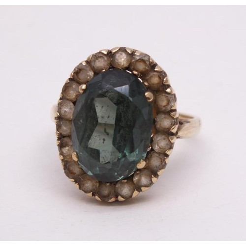 322 - 9ct GOLD RING LARGE GREEN STONE AND CZ STONES