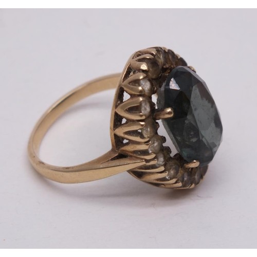 322 - 9ct GOLD RING LARGE GREEN STONE AND CZ STONES