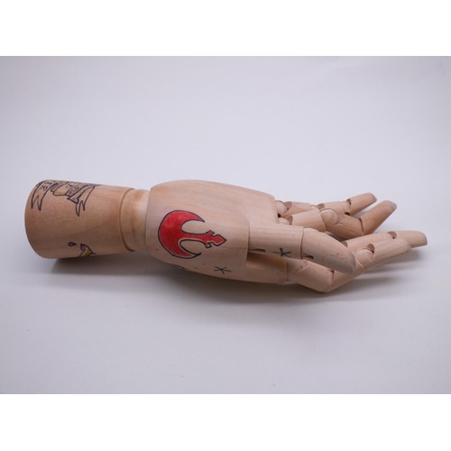 221 - ARTICULATED WOODEN HAND WITH TATTOO DESIGN