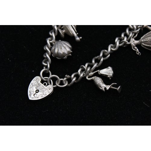 452 - Vintage .925 Sterling Silver CHARM BRACELET inc. 21st, Bell, Shell (47g)