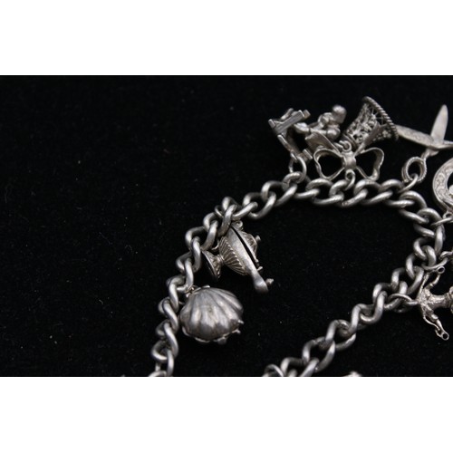 452 - Vintage .925 Sterling Silver CHARM BRACELET inc. 21st, Bell, Shell (47g)