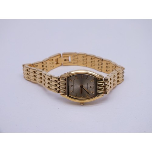 43 - LADIES ACCURIST GOLD TONE WATCH IN ORIGINAL BOX AND PAPERS ALONG WITH A CALVIN KLEIN GOLD TONE LADIE... 