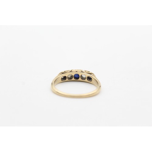 439 - 9ct gold sapphire & paste gypsy setting ring (3g) size P