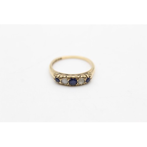 439 - 9ct gold sapphire & paste gypsy setting ring (3g) size P